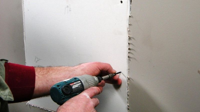how to repair drywall holes